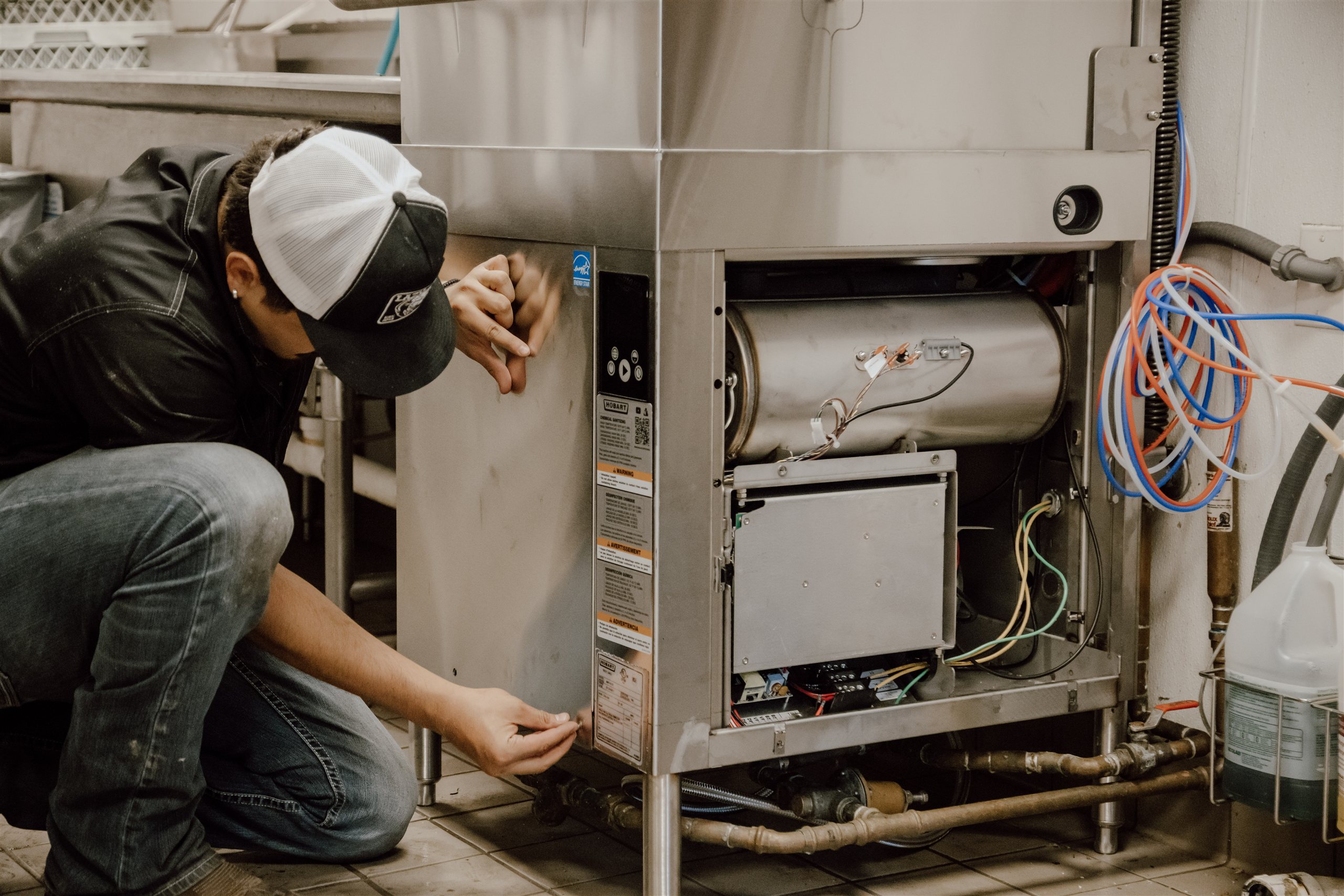 Maintenance Chef technician repairing commercial kitchen equipment &mdash; Denver, Colorado